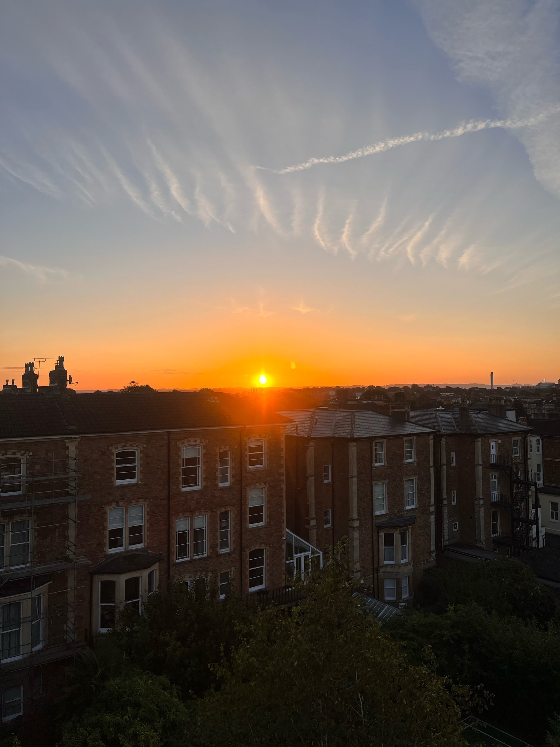 Sunrise over Bristol, England with wispy cloud formation