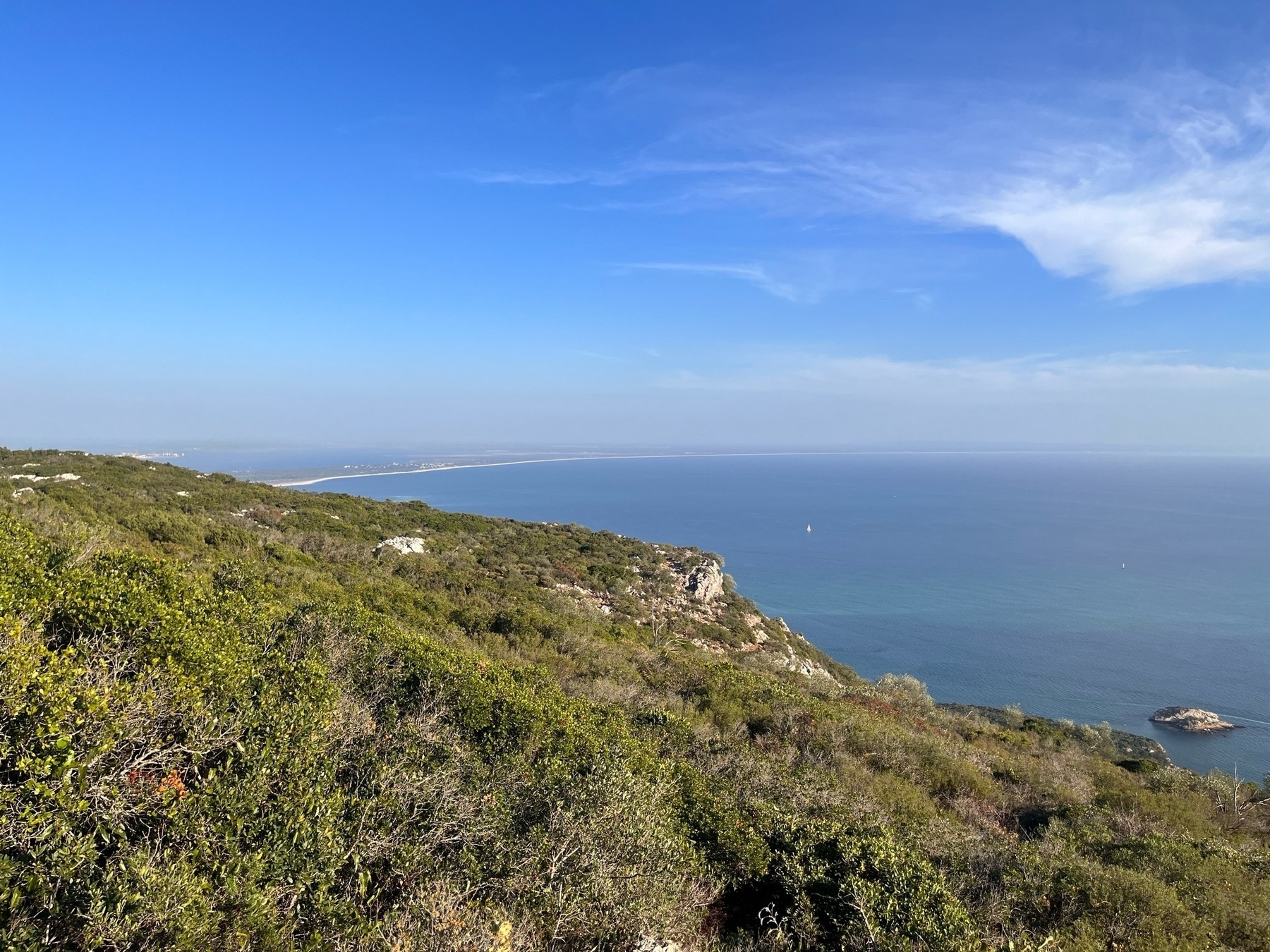 Arrábida Natural Park in Portugal looking from the upper hills across the sea to the Long Beach running past Comporta