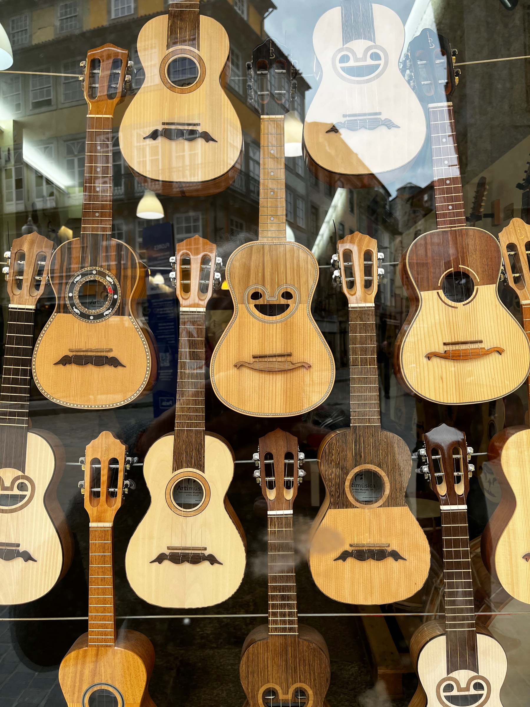 Ukuleles in the shop window of Porto Guitarra, in Porto, Portugal